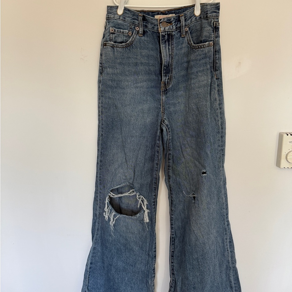 Levi's Blue Flare Jeans with Distressed Details